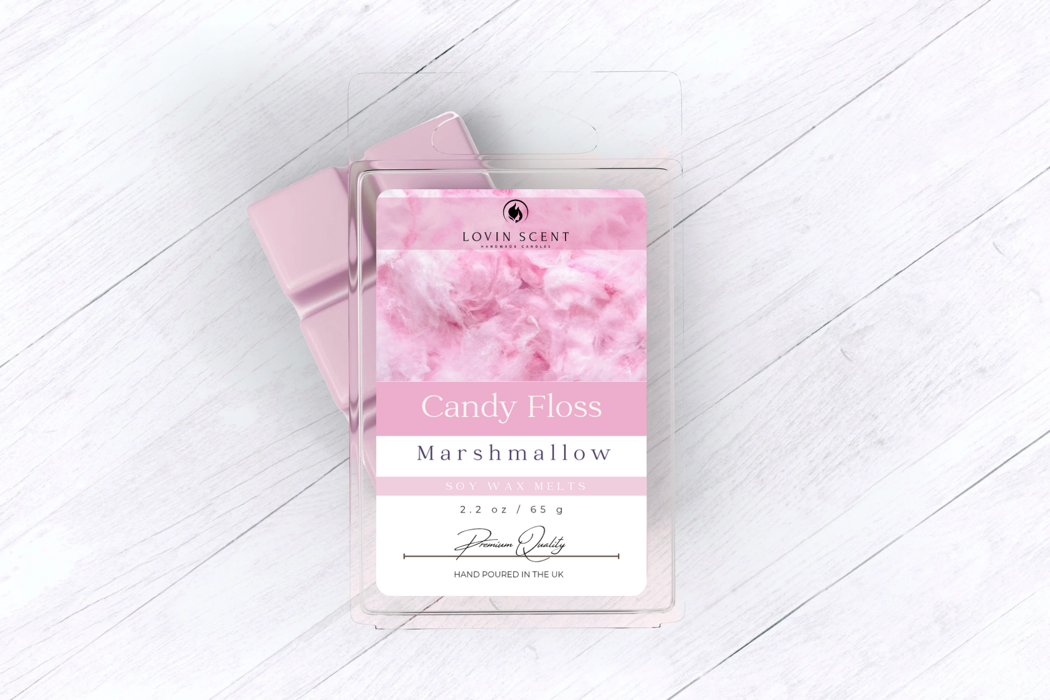 Marshmallow candy floss packaging on a white wooden surface