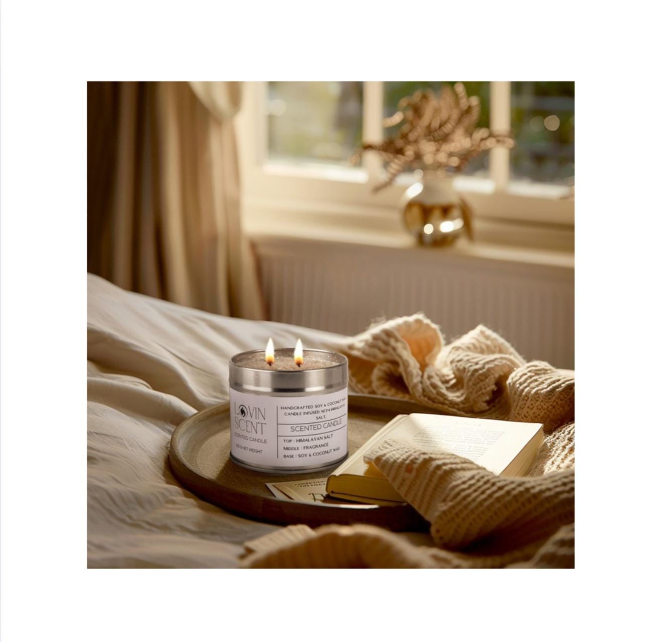 Candle in a glass container with a wooden lid on a tray, surrounded by soft lighting and cozy decor.