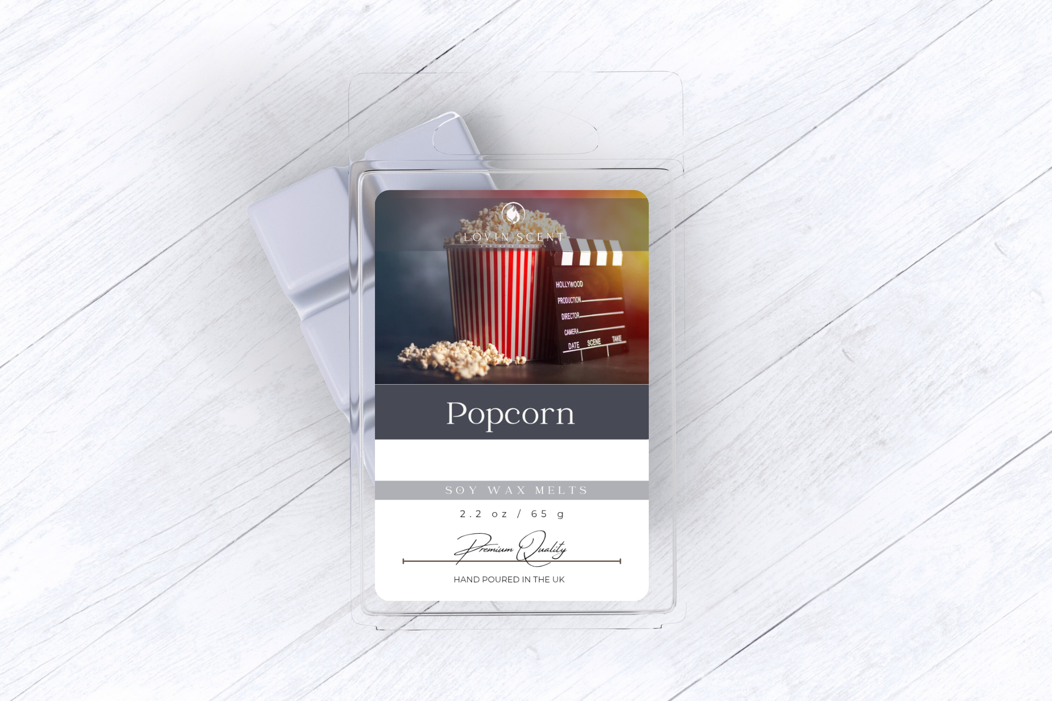 Packaged popcorn with a movie theater scene on a white surface