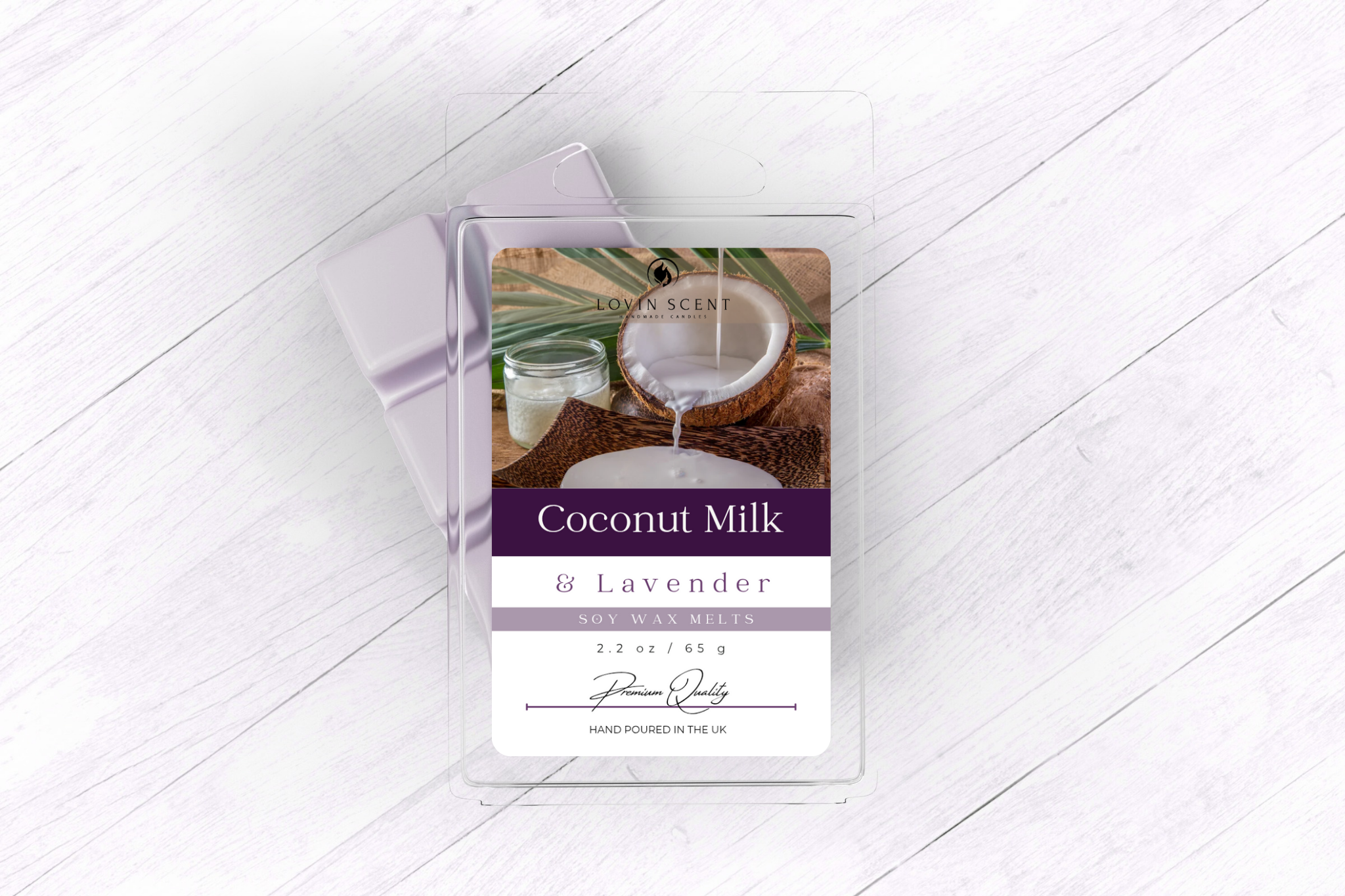 Coconut milk and lavender product packaging on a white wooden surface