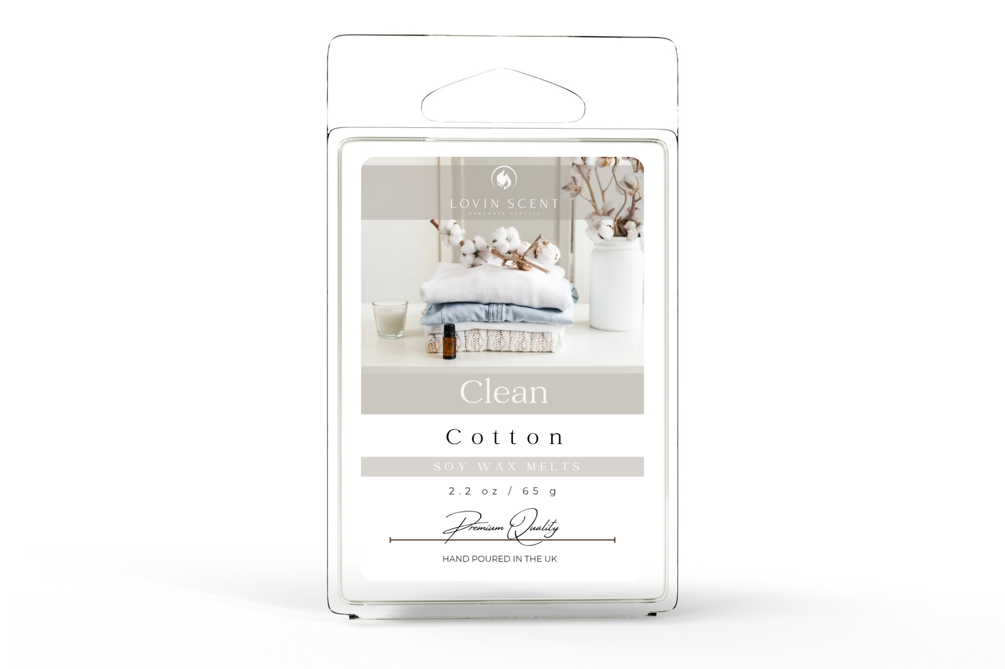 Package of a candle labeled 'Clean Cotton' by Design Factory on a white background