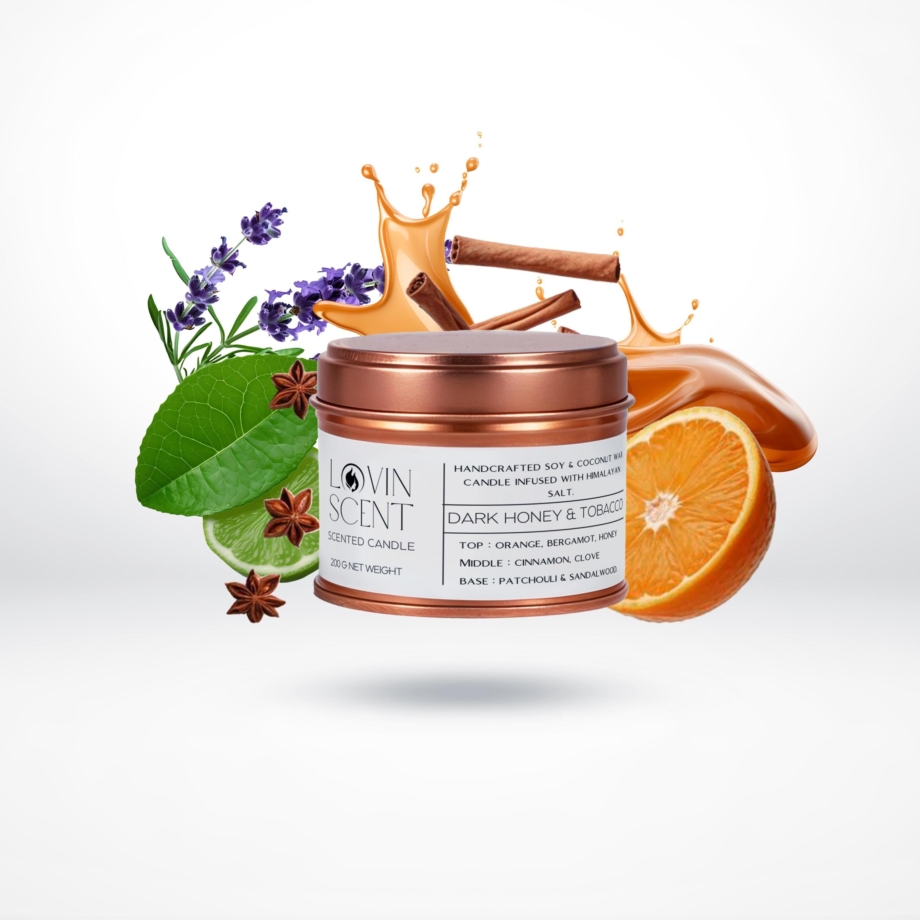 Copper candle jar with 'Oven Scent' branding surrounded by orange slices, cinnamon sticks, lavender flowers, and green leaves on a white background.