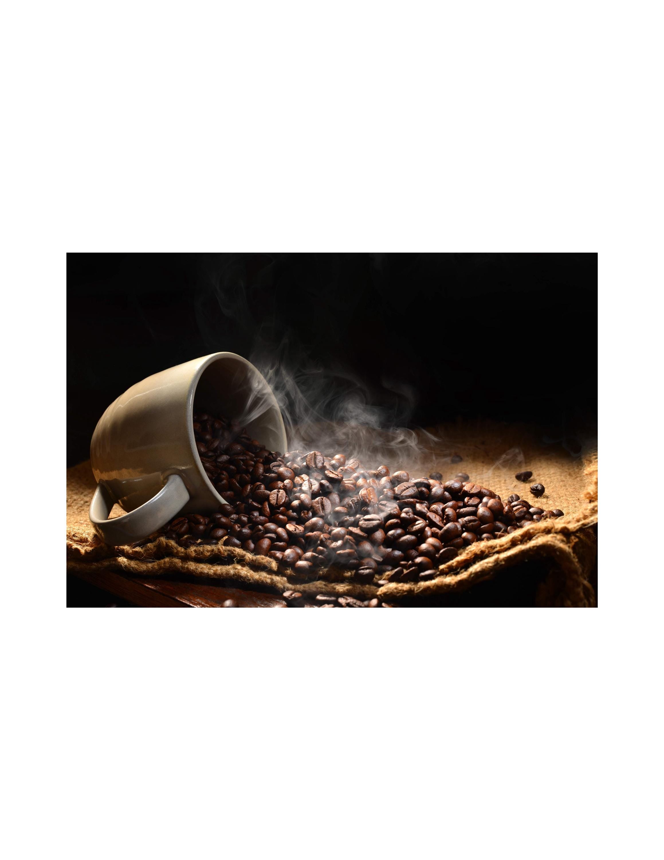 Cup and coffee beans with steam on a dark background