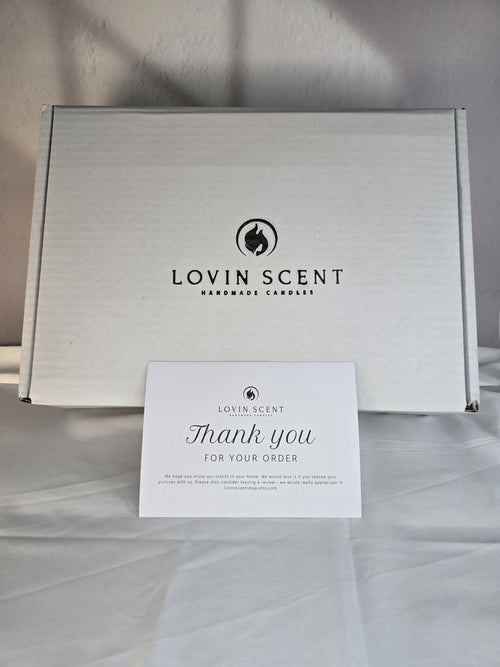 White box with 'Lovin Scent' logo and a 'Thank you for your order' card on a light background